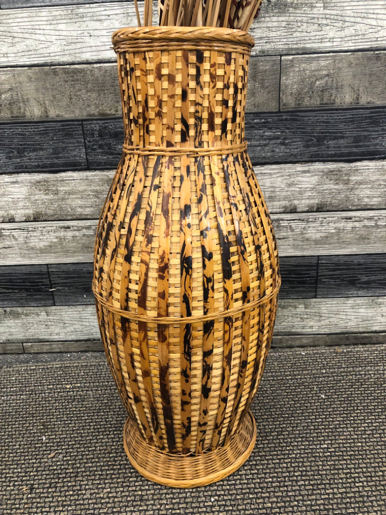 FAUX CAT TAILS IN WOVEN BASKET FLOOR VASE.