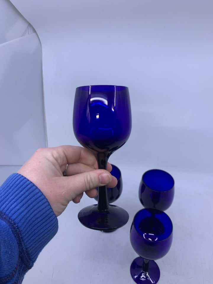 4 SMALL COBALT BLUE WINE GLASSES.