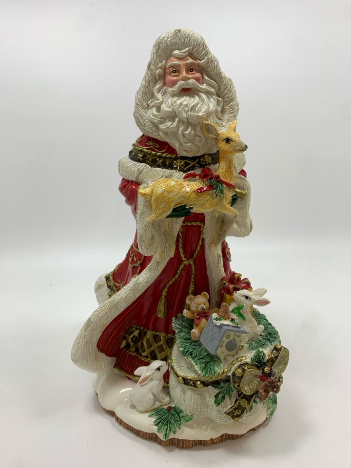 MUSICAL SANTA AND WOODLAND ANIMAL FIGURINE.