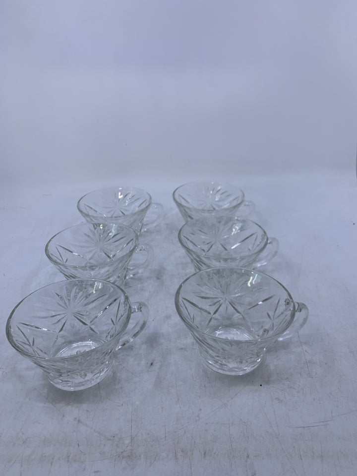 6 SHORT GLASS CUPS W/ STAR PATTERN.