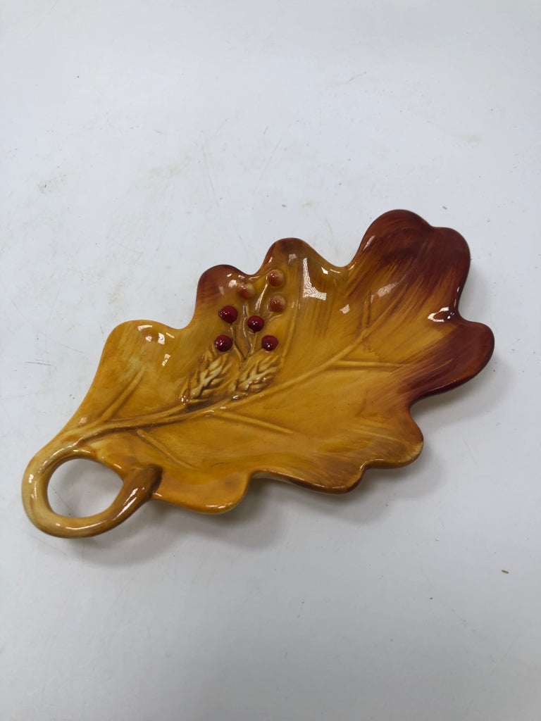 CERAMIC ORANGE LEAF DISH.