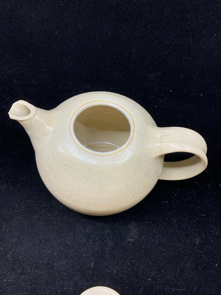 TAN POTTERY TEAPOT.