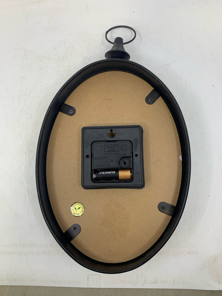 VINTAGE STYLE OVAL WALL CLOCK.