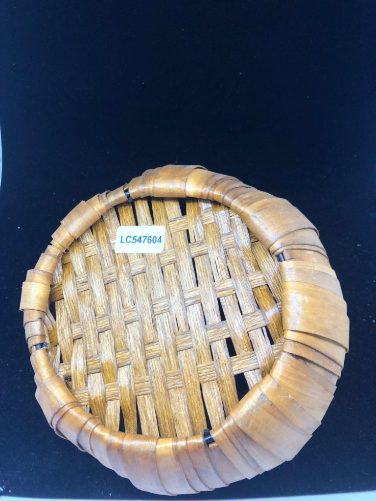 WELL MADE ROUND BASKET W TWIG WRAPPED HANDLES.