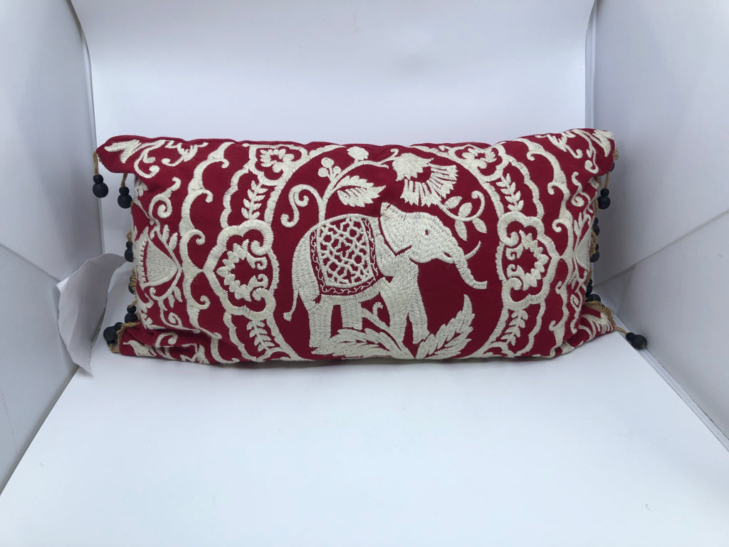 RED AND WHITE RECTANGLE ELEPHANT PILLOW.