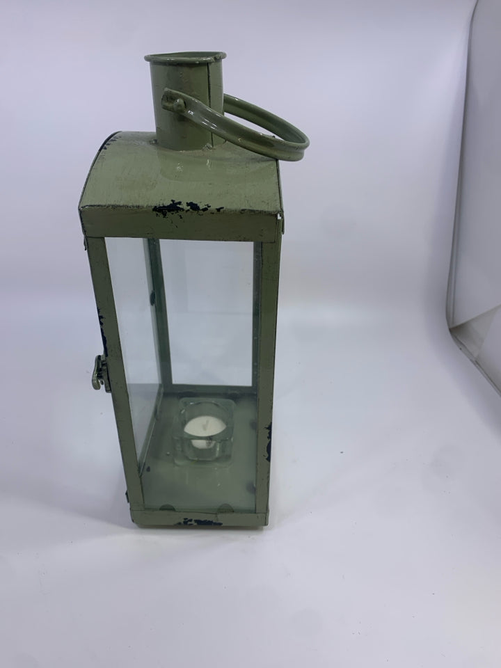 GREEN METAL LANTERN.