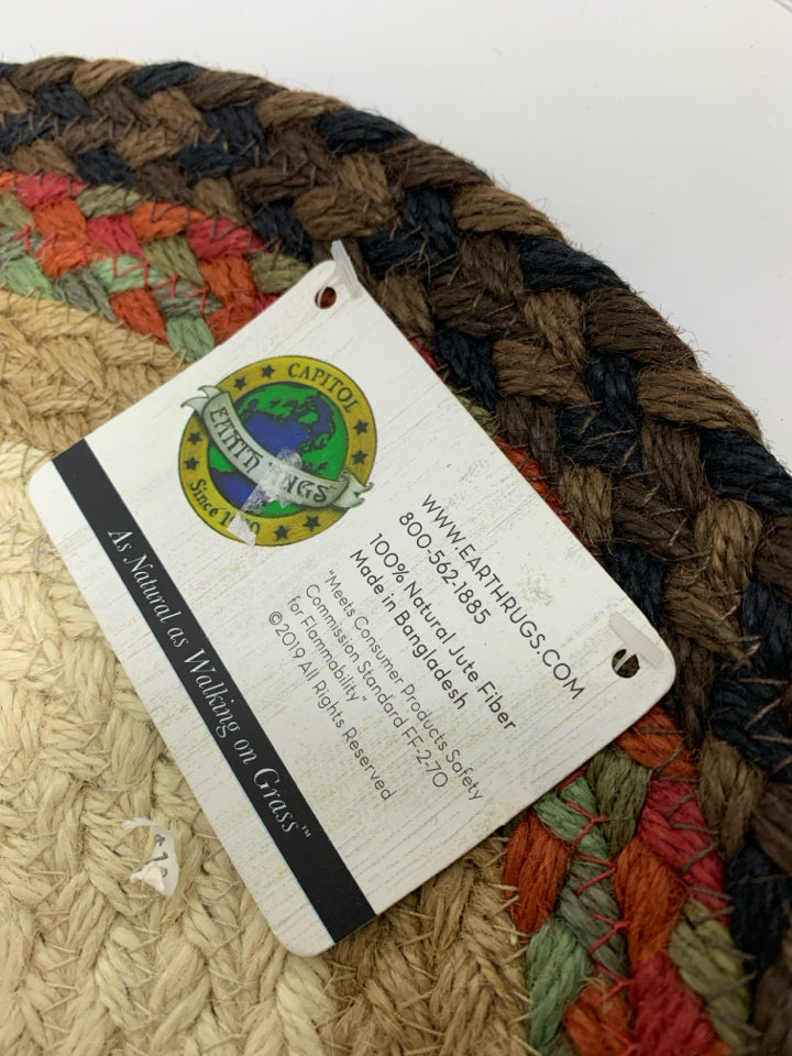 NWT SMALL OVAL BRAIDED RUG W/ PAINTED RED TRUCK EARTH RUNGS.
