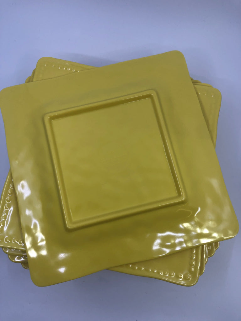 9 YELLOW SQUARE PLASTIC PLATES.