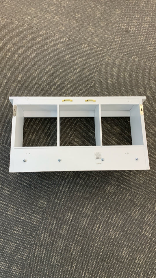 WHITE WOOD WALL SHELF W/3 CUBBIES AND HOOKS.