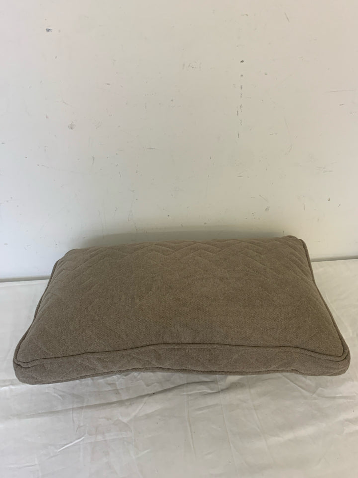 RECTANGLE DARK TAN PILLOW W/ ZIG ZAG STITCHING.