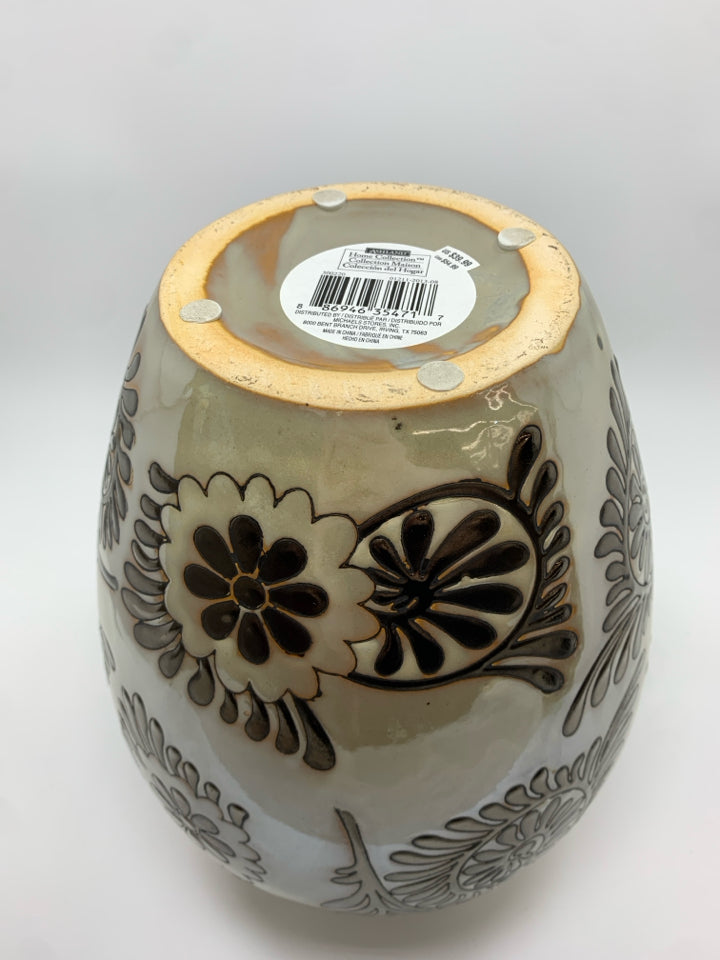 TAN W/BROWN FLORALS CERAMIC VASE.