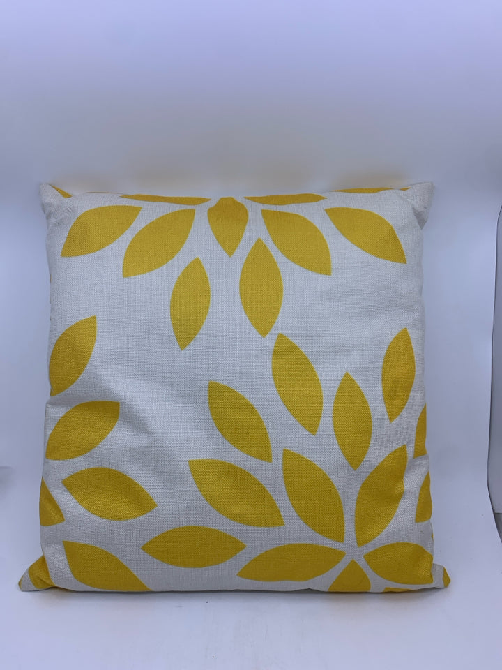 YELLOW FLORAL PATTERN PILLOW.