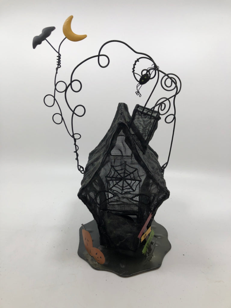 METAL HANGING HAUNTED HOUSE TEA LIGHT HOLDER.