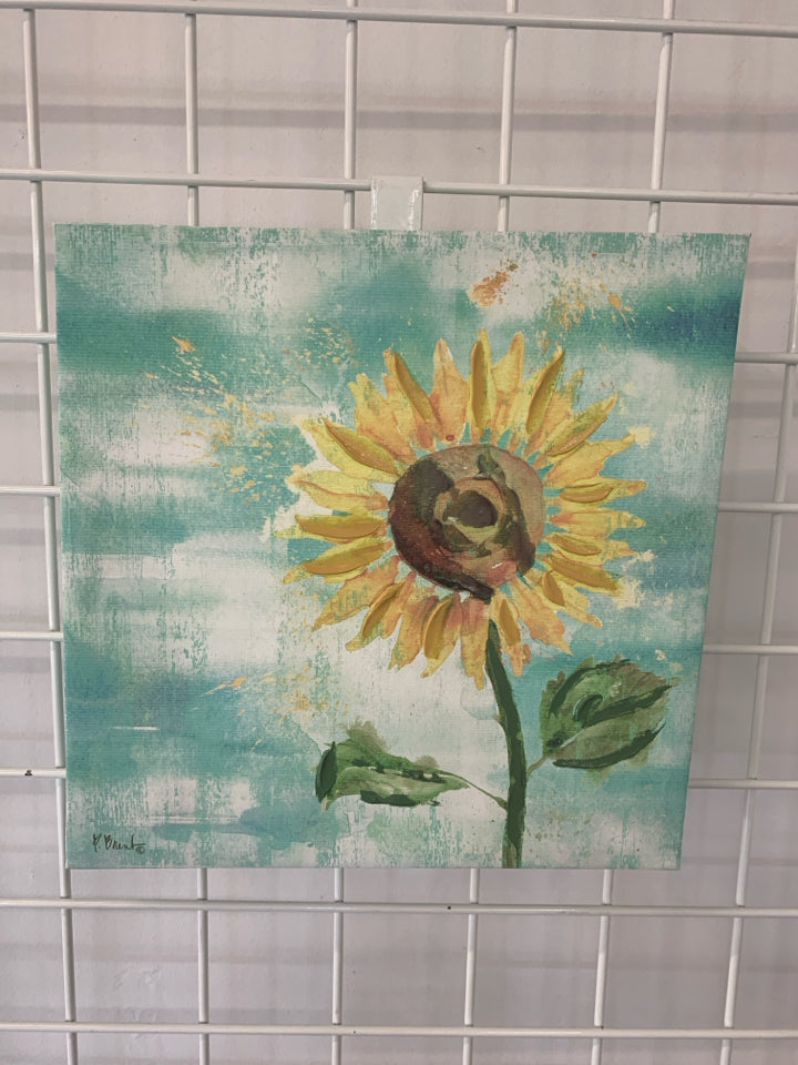 SINGLE SUNFLOWER IN TEAL BACKGROUND CANVAS WALL ART.