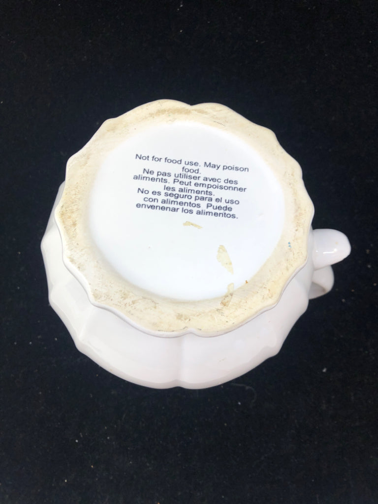 WHITE CERAMIC PITCHER VASE.