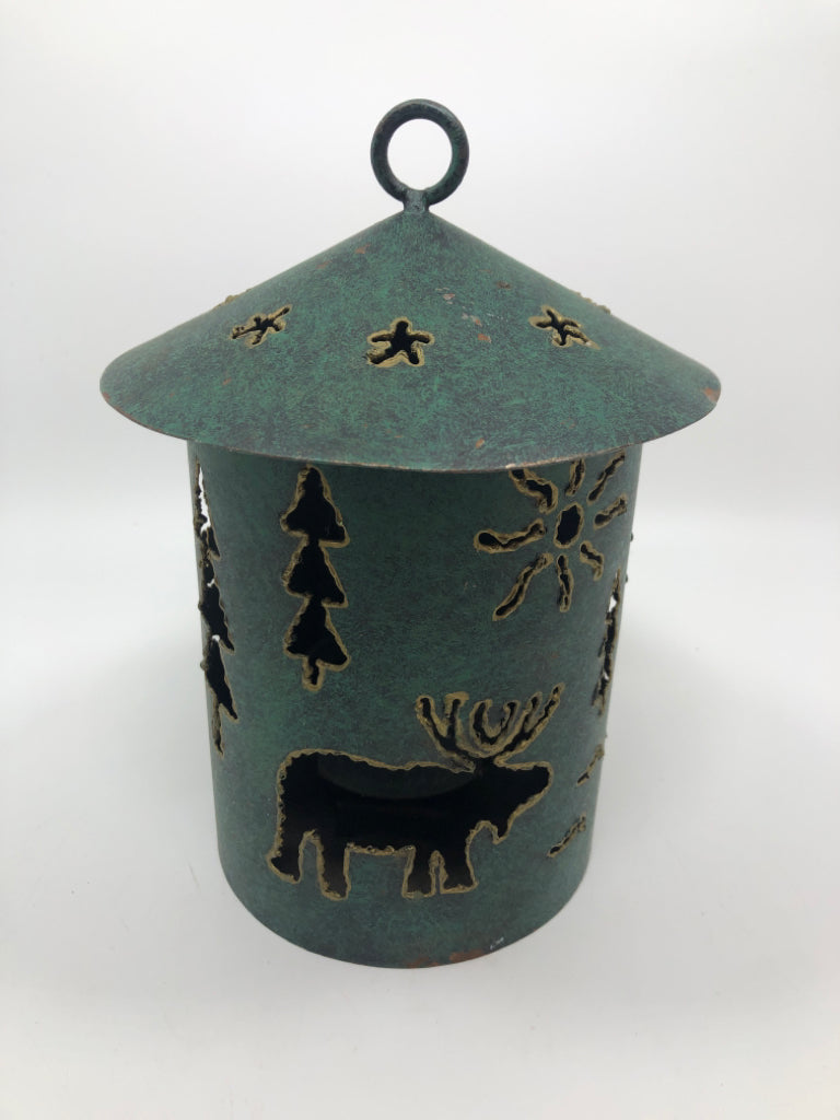GREEN METAL WINTER CANDLE LANTERN.