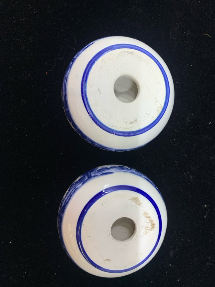 2 ROUND BLUE/WHITE WINDMILL TEA LIGHT HOLDERS.