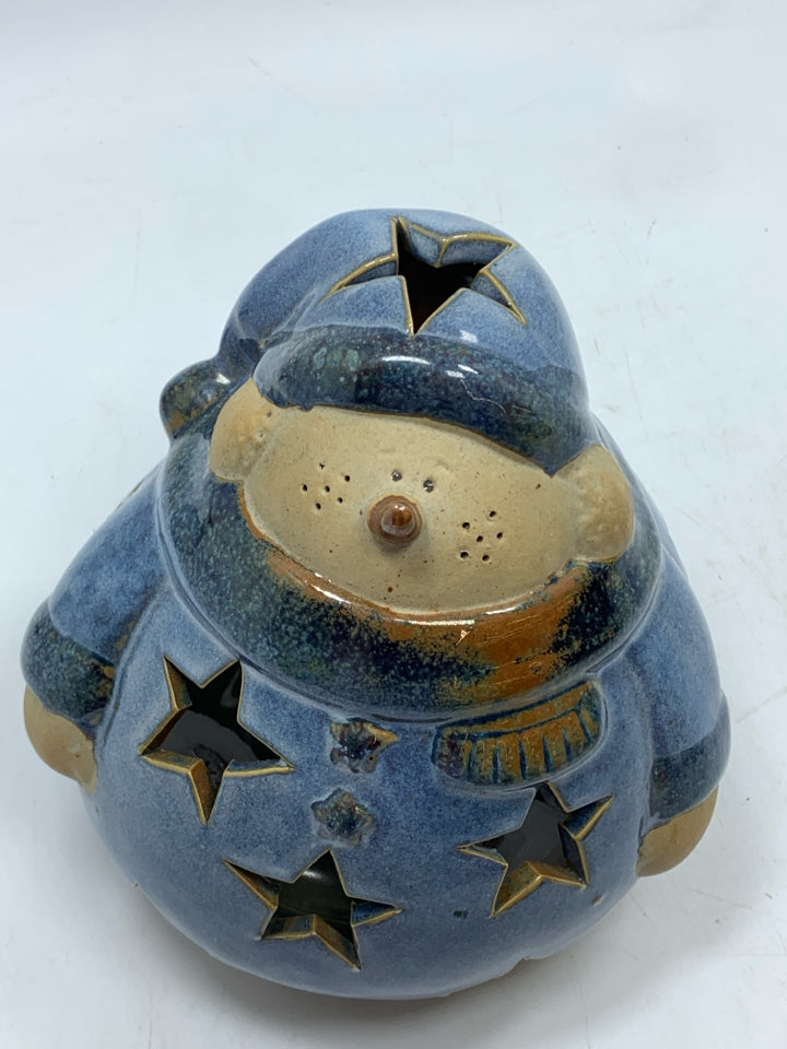 BLUE STAR PIERCED FAT SNOWMAN TEALIGHT HOLDER.