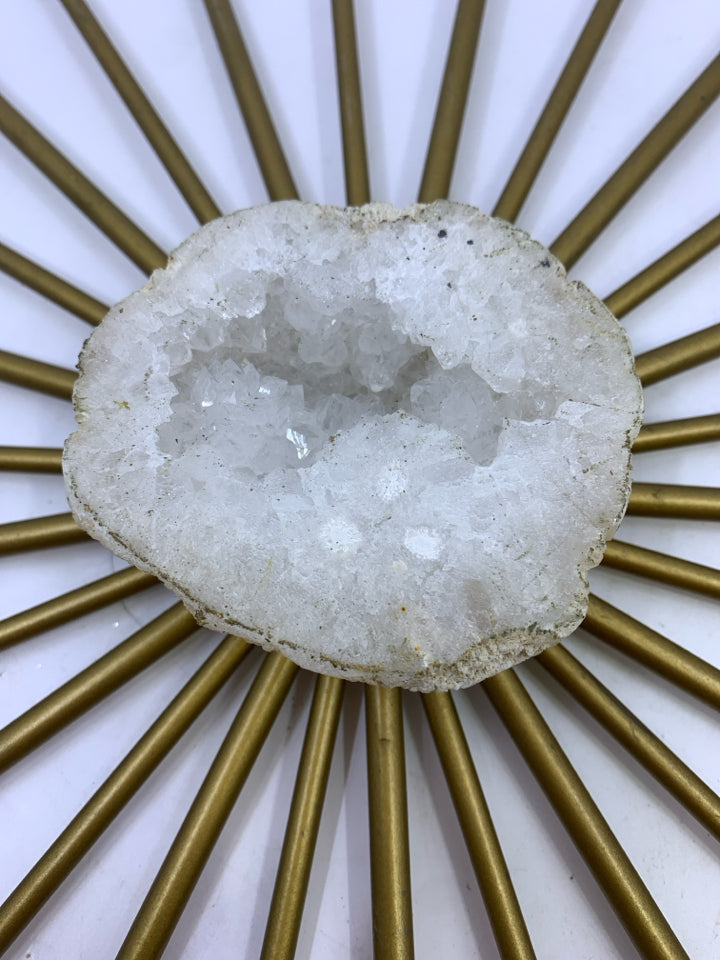 BRASS STARBURST W/ WHITE QUARTZ ROCK.