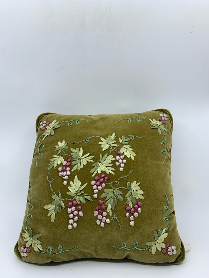 GREEN EMBROIDERED PILLOW.