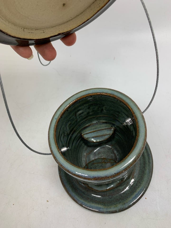 TEAL POTTERY HANGING BIRD FEEDER.