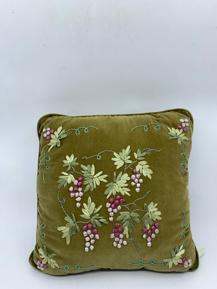 GREEN EMBROIDERED PILLOW.