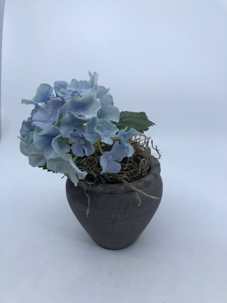 FAUX BLUE HYDRANGEAS IN GREY PLANTER.