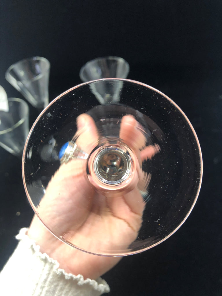 4 CLEAR SMALL FLUTE GLASSES.