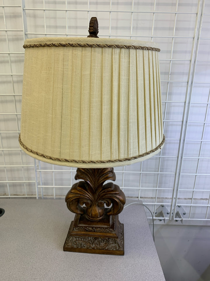 BROWN LEAVES FLEUR DE LIS LAMP W CREAM SHADE.