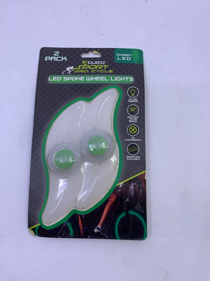 NIB GREEN LED BICYCLE SPOKE WHEEL LIGHTS.