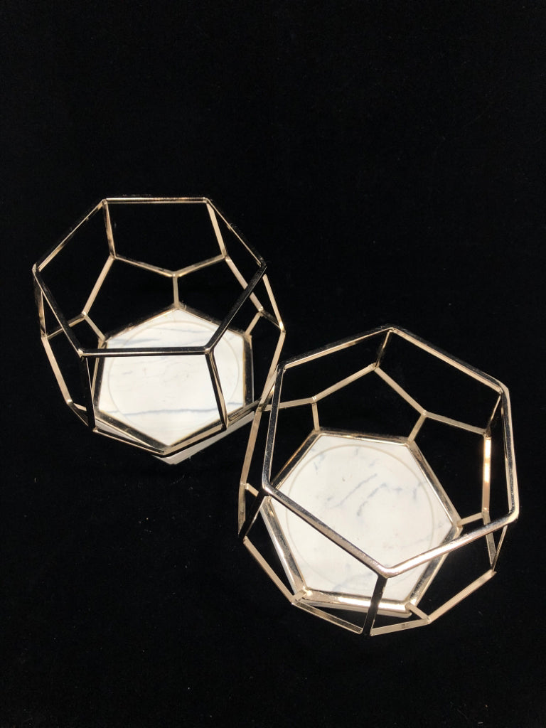2 LG GOLD GEOMETRIC CANDLE HOLDERS.