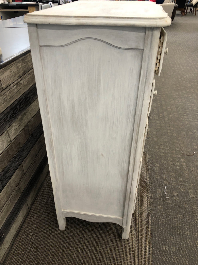 DISTRESSED WHITE WOODEN DRESSER.
