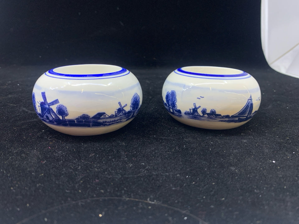 2 ROUND BLUE/WHITE WINDMILL TEA LIGHT HOLDERS.