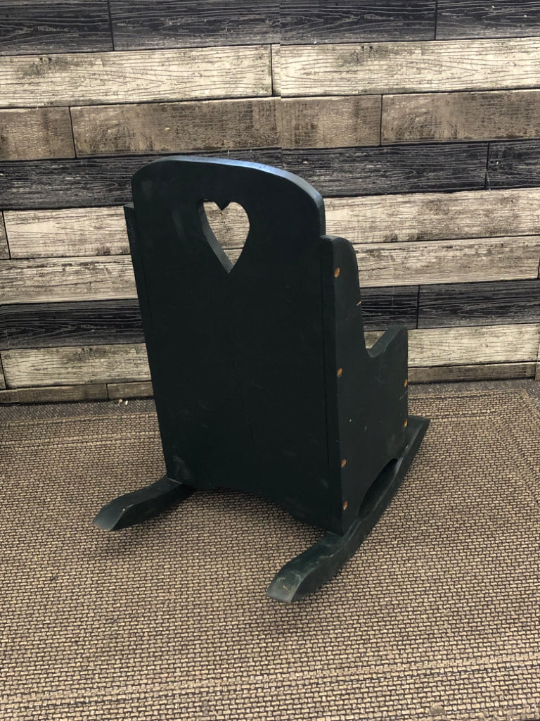 SMALL GREEN DECORTIVE ROCKING CHAIR.
