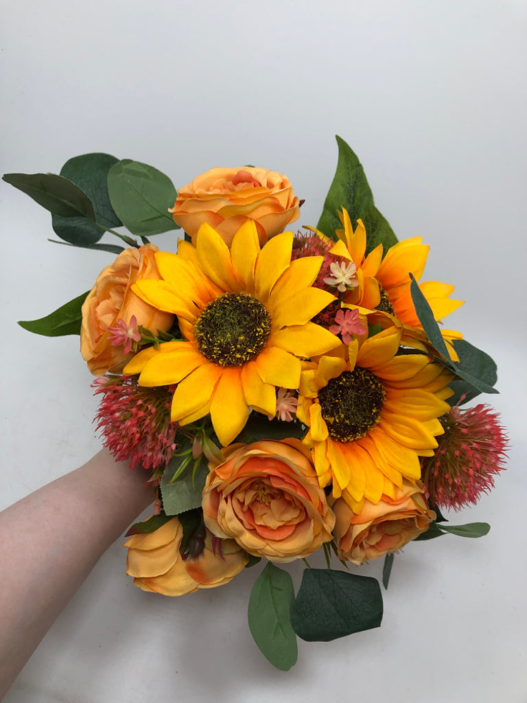 FAUX ORANGE/RED FLOWERS W/TWINE RIBBON.