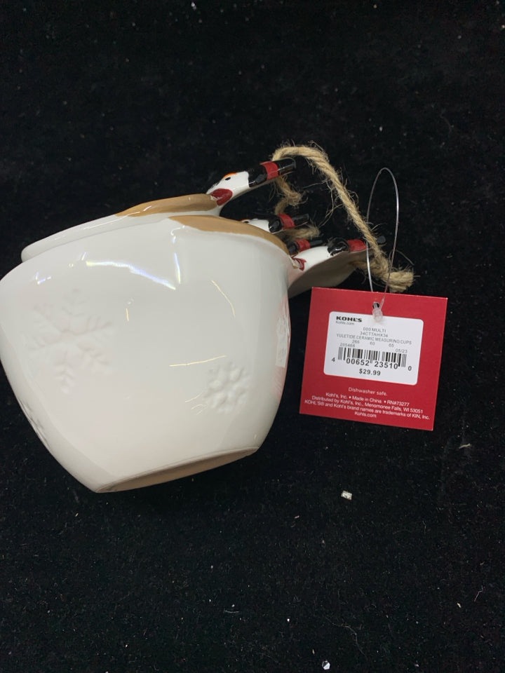 NWT CERAMIC SNOWMEN MEASURING CUPS.