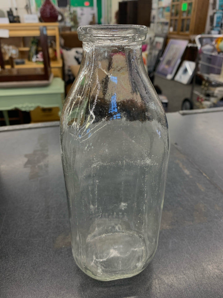 CLEAR MILK EMPTY BOTTLE.