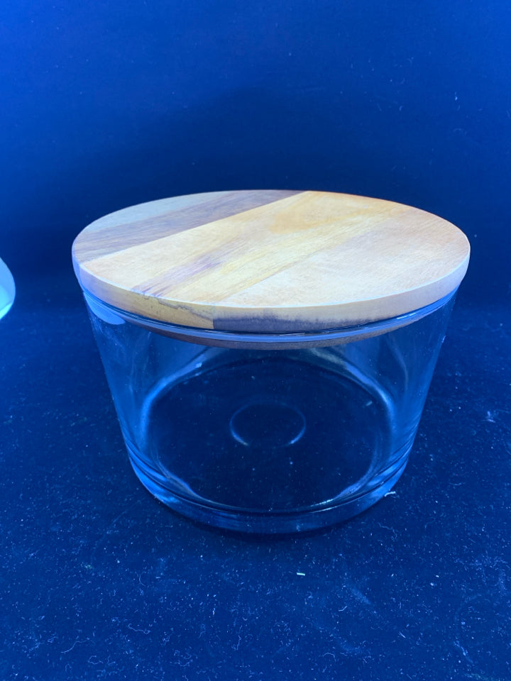 HEAVY THICK GLASS CANISTER W/ WOOD SUCTION TOP.