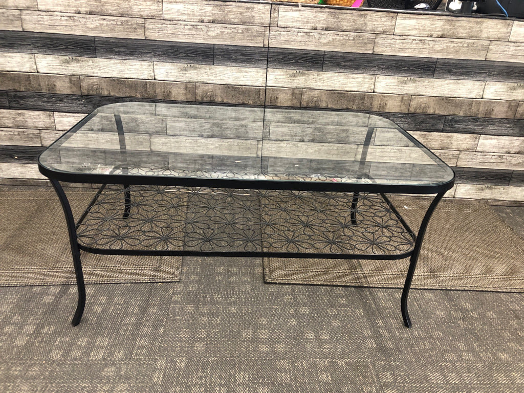 ROUNDED CORNER GLASS TOP COFFEE TABLE.