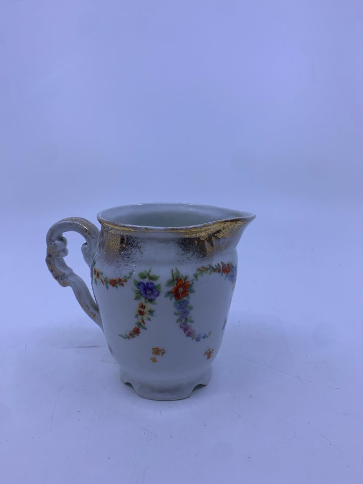 VTG THIN PORCELAIN FLORAL CREAMER.