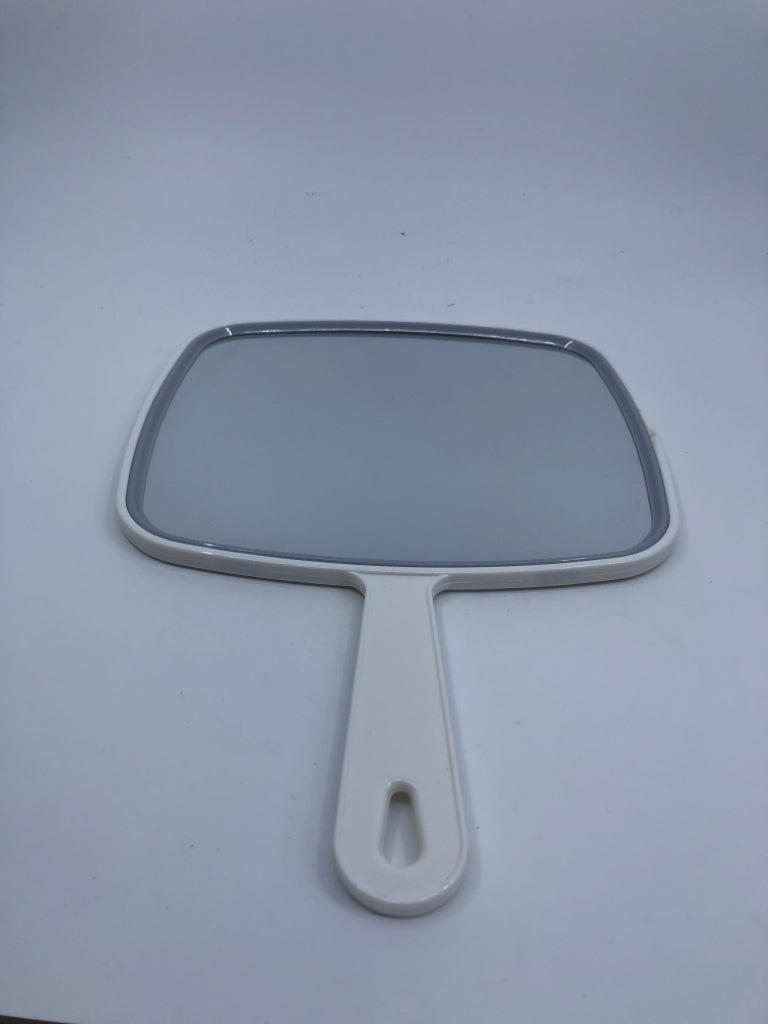 WHITE HANDHELD MIRROR.