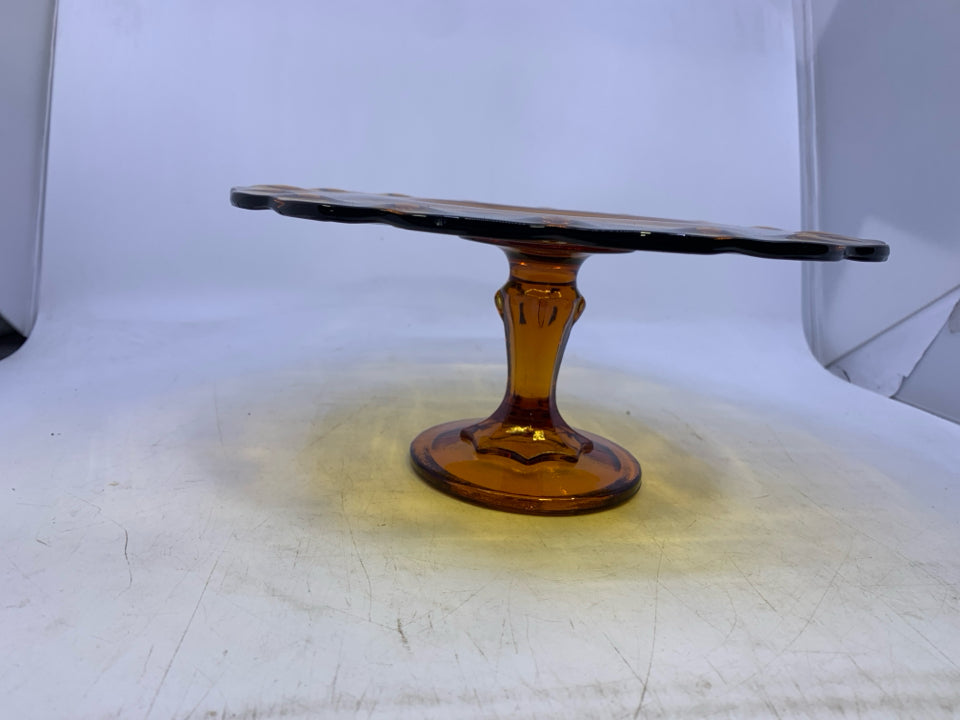 VTG AMBER GLASS CAKE STAND.
