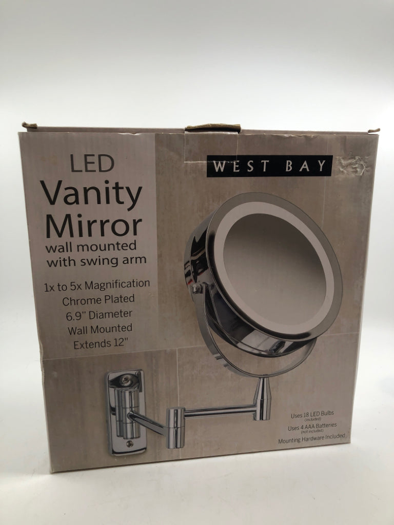 NIB LED VANITY MIRROR W/SWING ARM.