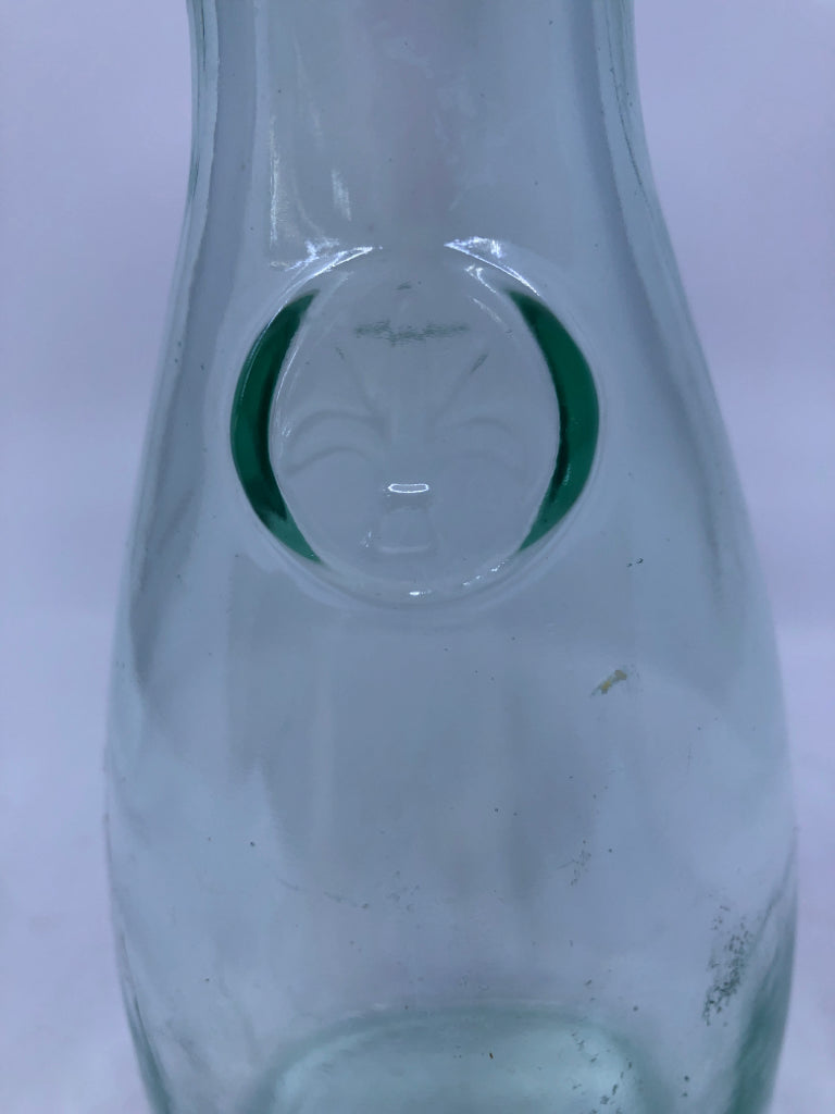 GREEN TINTED GLASS BOTTLE.