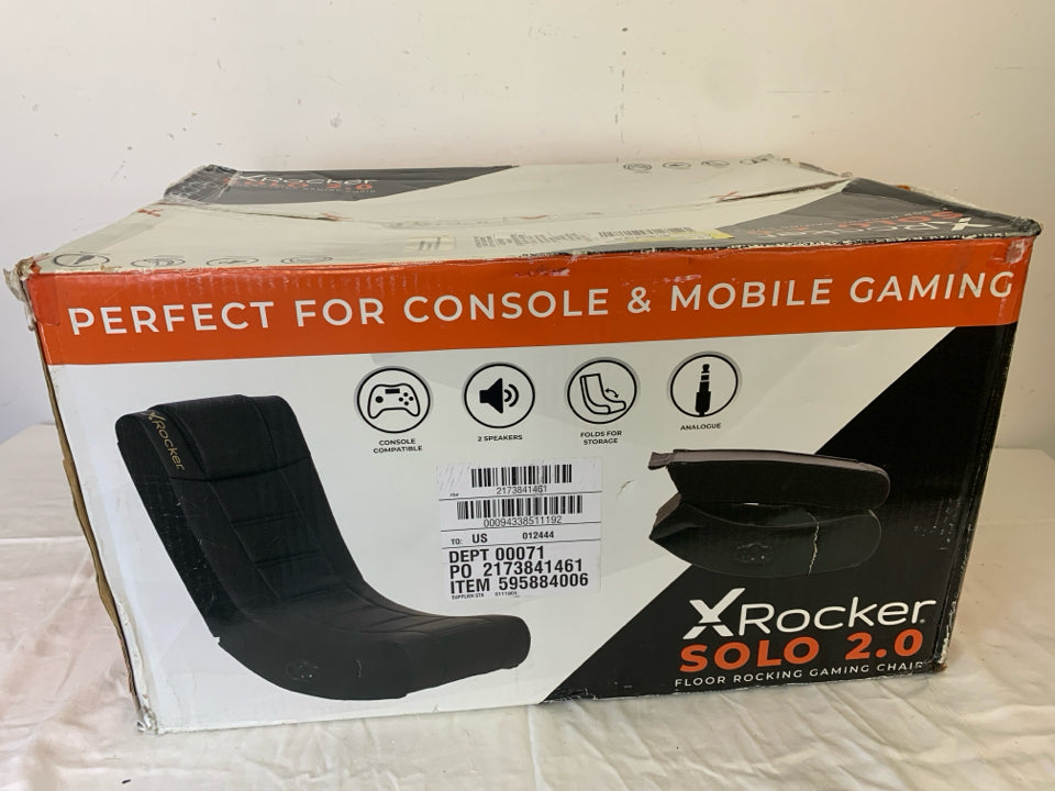 NIB ROCKER GAMING CHAIR.