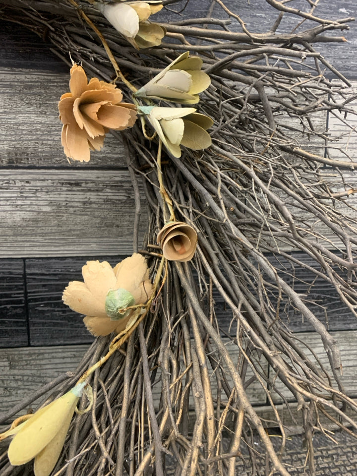 LARGE TWIG WREATH W WOOD FLOWERS.