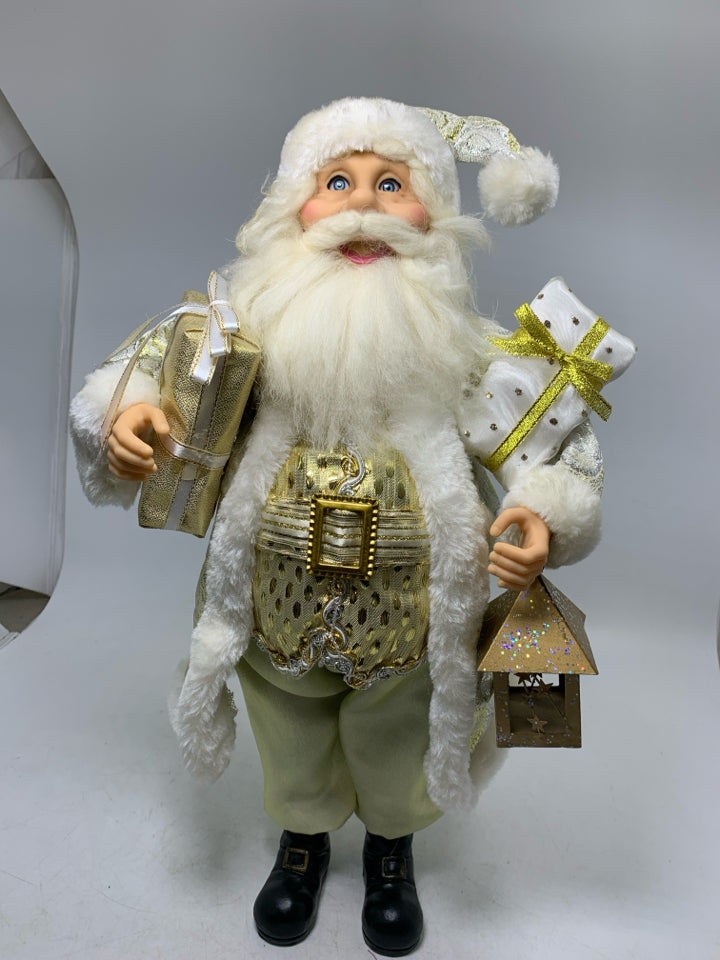 LIGHT WEIGHT SANTA DRESSED IN GOLD SUIT HOLDING PRESENTS/LANTERN.