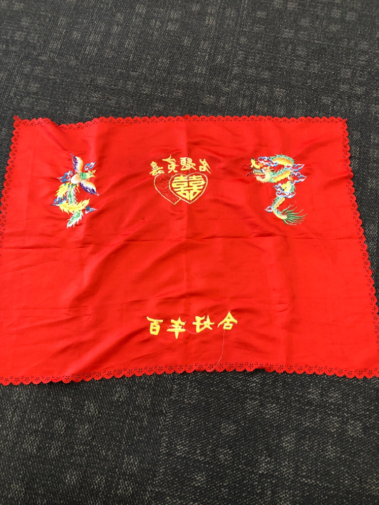 RED TABLE CLOTH W CHINESE DRAGON AND LETTERS.