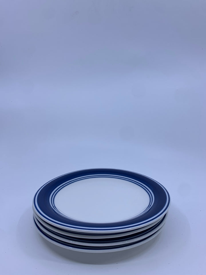 4 BLUE RIMMED DESSERT PLATES.