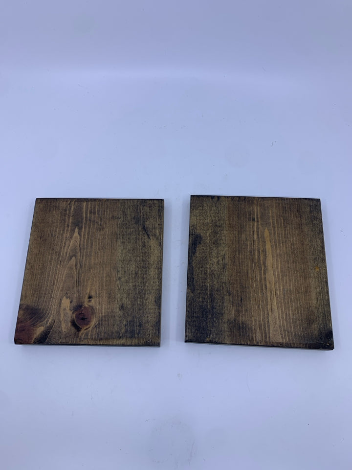 2 WOOD CANDLE PLATES.